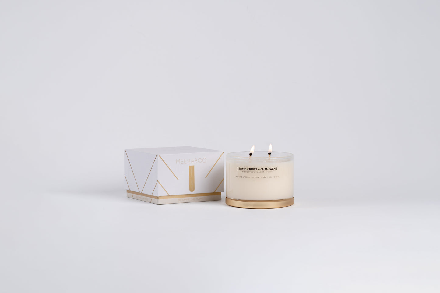 Bougie à la cire de soja avec couvercle doré champagne et fraises